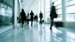 © kiki__ - Blurry Motion Of People In An Office Hallway