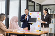 © SOMKID - Team of Asian business people and working together in office, Startup projects and business presentation at meeting room.