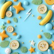 © nuiiko - Banana slice energy concept. A vibrant arrangement of colorful fruits and playful shapes set against a bright blue background, creating a cheerful and whimsical atmosphere.