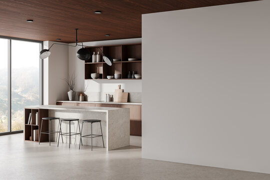 Modern kitchen interior featuring a blank wall, stylish furniture, and natural light from large windows. Concept of space and layout. 3D Rendering