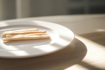 Poster - A simple, yet elegant arrangement of three slices on a white plate