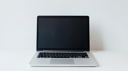 Poster - A stylish laptop rests on a pristine white background, showcasing its modern design and bright screen