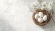 © Rodica - Elegant spring nest with white eggs and delicate flowers on textured background Background with space for text