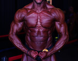 bodybuilder body part details. bodybuilder in competition, detail.