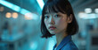 © Yury - Young Asian Woman with Thoughtful Expression in Futuristic Blue Environment