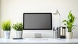 © VizAI - Modern Workspace with Computer, Plants, and Office Supplies