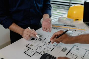 Poster - an architect and an engineer are discussing about big projects that they have to take responsibility for together, engineer and his assistant are meeting about the first draft of blueprint