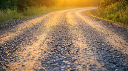 Aufkleber - A serene gravel road winding through the heartland at sunset with golden light illuminating the path