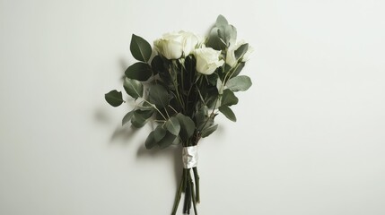 Poster - Minimalist bouquet of white roses and green foliage arranged elegantly against a light background for a fresh, modern touch