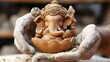 © wannakorn - Traditional Clay Idol of Lord Ganesha