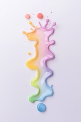 Wall Mural - An artistic splash of vibrant liquid paint flows gracefully, creating a colorful gradient on a clean surface, perfect for creative projects.