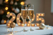 © Olha Ye - Elegant celebration: two champagne glasses toasting to 2025 with festive decor. happy new year 2025