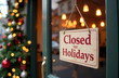 © algae5 - A wooden sign with the words closed on it on the door of a shop with Christmas decorations
