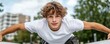 © adaptable_Lark98A1 - A young man practicing parkour in an urban setting, showcasing agility
