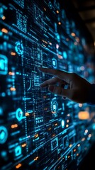 Leinwandbilder - A hand points at a screen filled with futuristic data and icons.