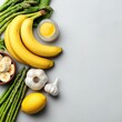©  Green Creator - A balanced diet featuring foods like bananas, garlic, and asparagus, highlighting their high inulin and FOS content