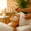 © cff999 - a woman getting a facial treatment at a spa