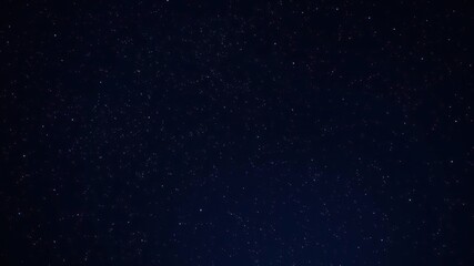Wall Mural - dark canvas of the night sky with countless stars twinkling like diamonds against a deep blue backgr