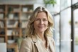 © Maryna - Middle Aged Woman Business. Portrait of Smiling Businesswoman Standing in Office