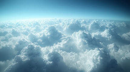 Wall Mural - A serene view of fluffy clouds against a blue sky, evoking tranquility and openness.