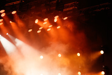 Wall Mural - Red-orange color on stage at a concert