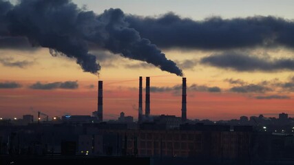 Wall Mural - Smoke from factory pipe of heat station in the city in winter time. Fuel oil or natural gas-fired power plant. Air pollution. Chimneys, environmentally unfriendly, using coal for heating season. 