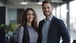 © bvbflo1 - Male and female business couple posing smiling