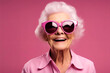 © Rayan Heaven - Smiling Elderly Woman in Sunglasses Portrait. A joyful elderly woman wearing stylish sunglasses, showcasing a bright smile against a dark background.