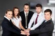 © BillionPhotos.com - Meeting, group of business people hold hands together
