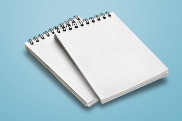 Canvas Print - Top view of blank notebook and pen on background