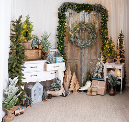 Wall Mural - Creative wooden photo zone with Christmas and winter elements