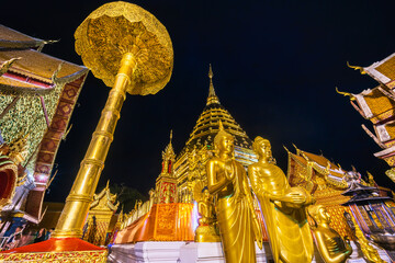 Wall Mural - Wat Phra That Doi Suthep is a Buddhist temple is a major tourist attraction Is an ancient Thai art with Twilight blue bright at dusk night and Public places in Chiang Mai,Thailand.