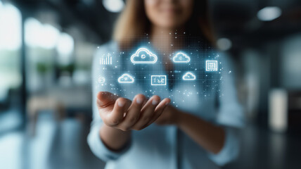 Poster - A woman is holding a hand up to show a computer screen with a cloud symbol. Concept of technology and innovation, as well as the idea of progress and advancement
