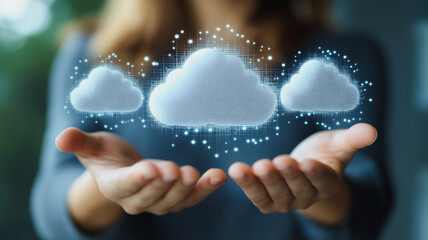 Poster - A woman is holding three clouds in her hand. The clouds are white and appear to be floating in the air. Concept of wonder and awe at the beauty of nature