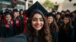 © UniqGraphicX - Young Indian college girl taking selfie after graduating from college in a graduation gown and cap, group of college students celebrating