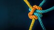 © Subatheesan - Team rope unity strength diverse connection support. Empower team bond rope concept integrate color background partnership power