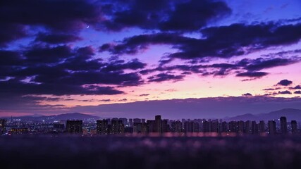 Wall Mural - Time lapse of city before the storm at evening