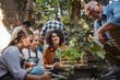 © Westend61 - Volunteers at neighbourhood project planting herbs in community garden