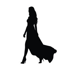 Wall Mural - A woman in a long dress is walking on a white background. She is wearing high heels