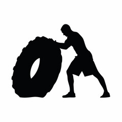 Wall Mural - A man is pushing a tire. The tire is black and white. The man is wearing shorts