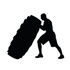 Wall Mural - A man is pushing a tire. The tire is black and white. The man is wearing shorts