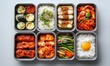 © TheoTheWizard - A variety of Asian food is displayed in a row of containers