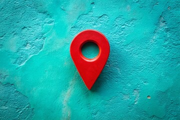 Poster - Isolated Red Location Pin on Textured Turquoise Background with Silhouette Effect for Digital Mapping and Navigation Concepts