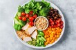 © poramin - Colorful plate filled with fresh vegetables, chicken, and grains, perfect for healthy meal preparation and nutrition.