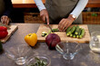 © Wavebreak Media - Woman chopping colorful vegetables in kitchen for thanksgiving dinner preparation, at home