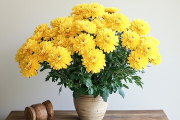 Poster - A vase filled with bright yellow flowers sits on top of a wooden table, perfect for decorating or using as a prop in photography