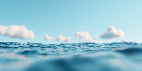 Wall Mural - A serene view of gentle ocean waves under a clear blue sky with fluffy white clouds.
