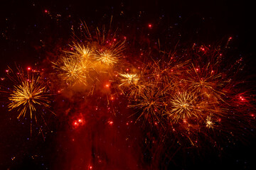 fireworks exploding against a night sky, at lewes in east sussex
