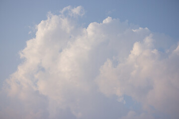 Wall Mural - A cloudless sky with a few clouds scattered throughout.