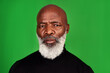© peopleimages.com - Studio, green screen and black man in portrait for fashion, confidence and winter style with pride. Retirement, male person and senior model by isolated background for casual clothes or natural beard